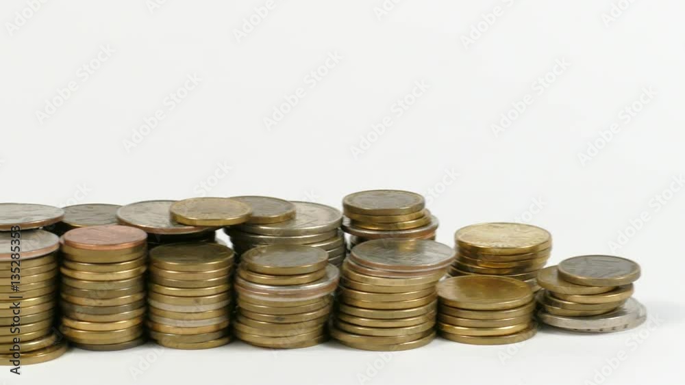 Saudi Arabia flag waving with stack of money coins Saudi Arabia flag waving with stack of money coins