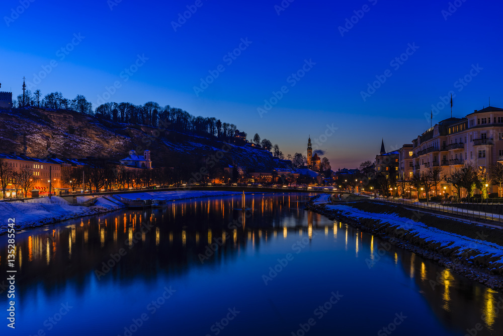 Panoramic night view of Salzburg and river Salzach, Salzburger L