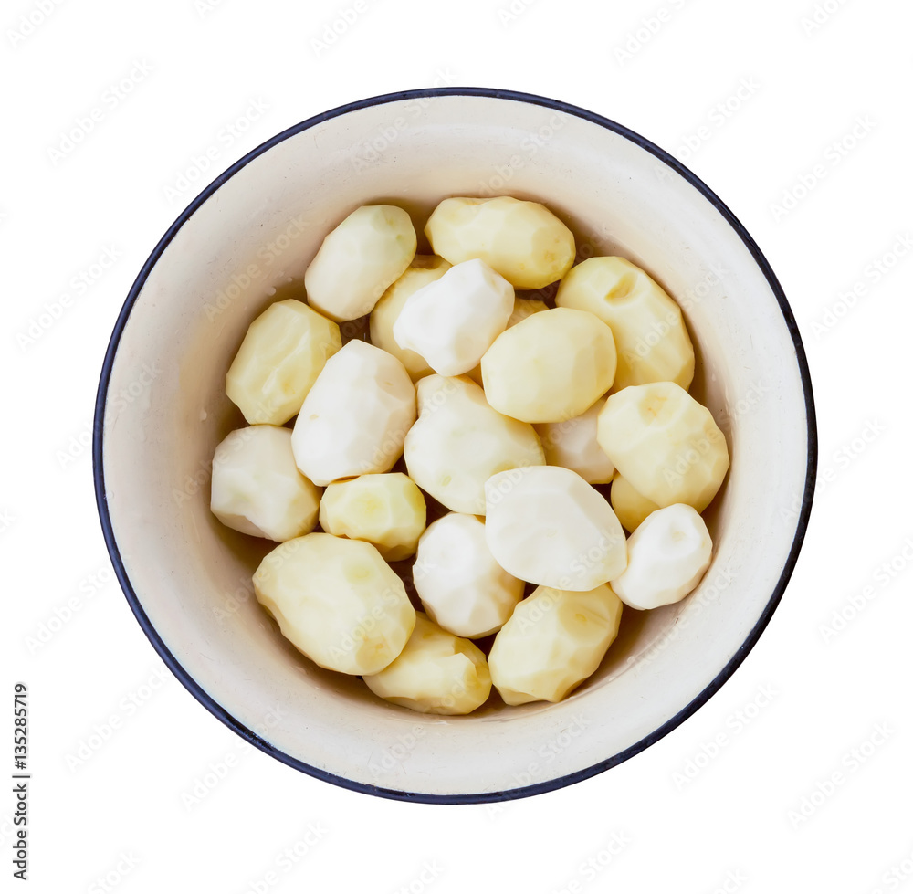 raw peeled potatoes isolated on white background, top view raw peeled potatoes isolated on white background, top view