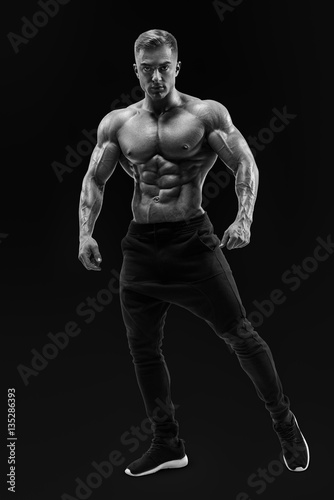 Shirtless male model posing muscular core