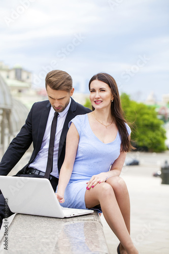 Attractive business young couple working together