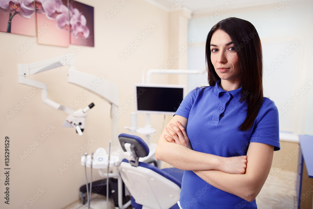 Female intern in dentist clinic Female intern in dentist clinic