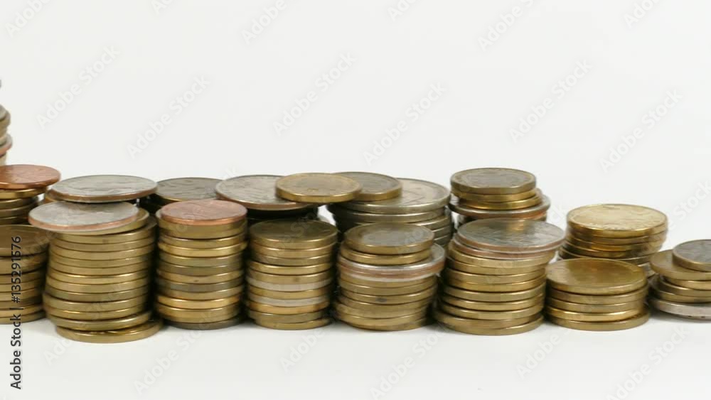 Uganda flag waving with stack of money coins Uganda flag waving with stack of money coins