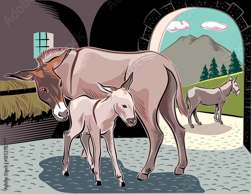 A donkey with her little puppy, in a stable.