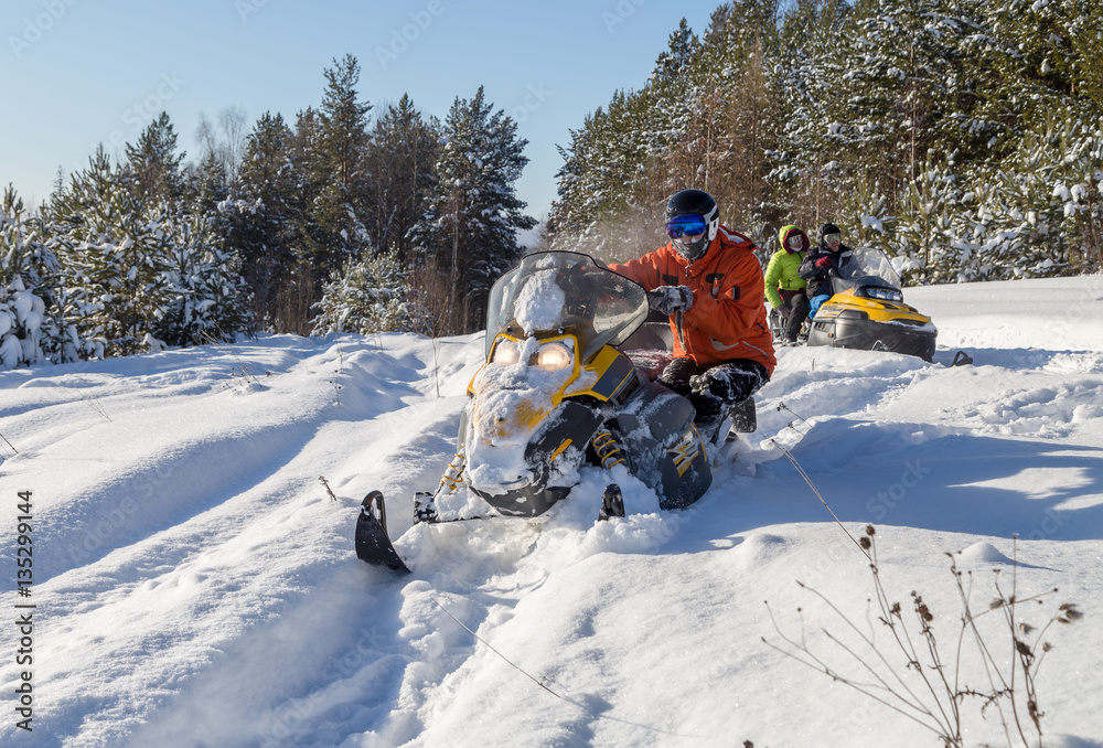 Athlete on a snowmobile