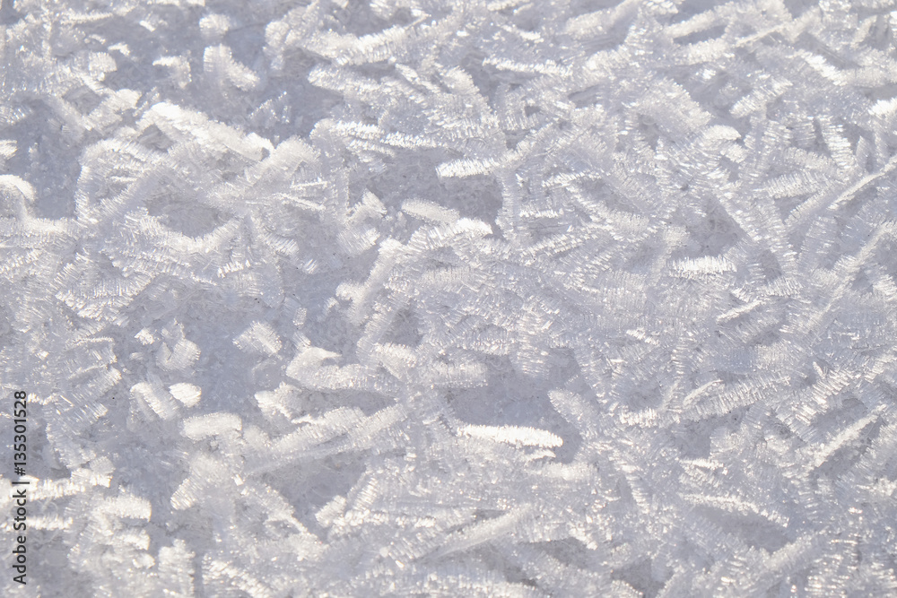 winter background.frozen ice crystals on the surface of the water winter background.frozen ice crystals on the surface of the water