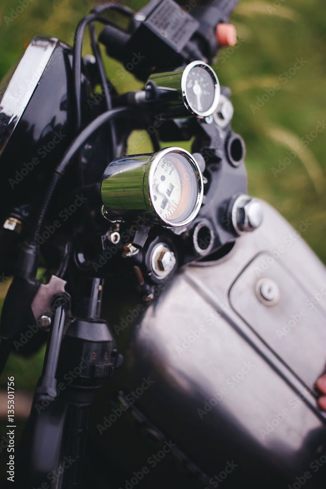 young man sitting on a motorcycle