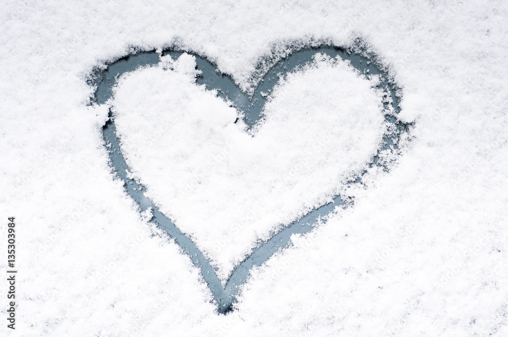 Heart for valentine drawn on a car windshield covered with fresh snow. Heart for valentine drawn on a car windshield covered with fresh snow.