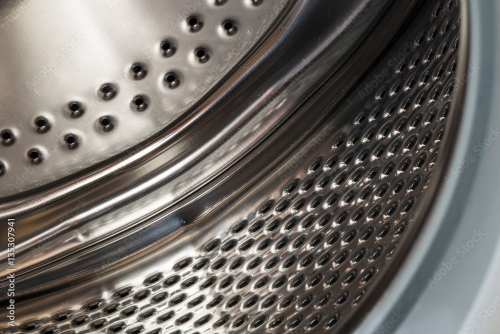 detail of drum washing machine close-up detail of drum washing machine close-up