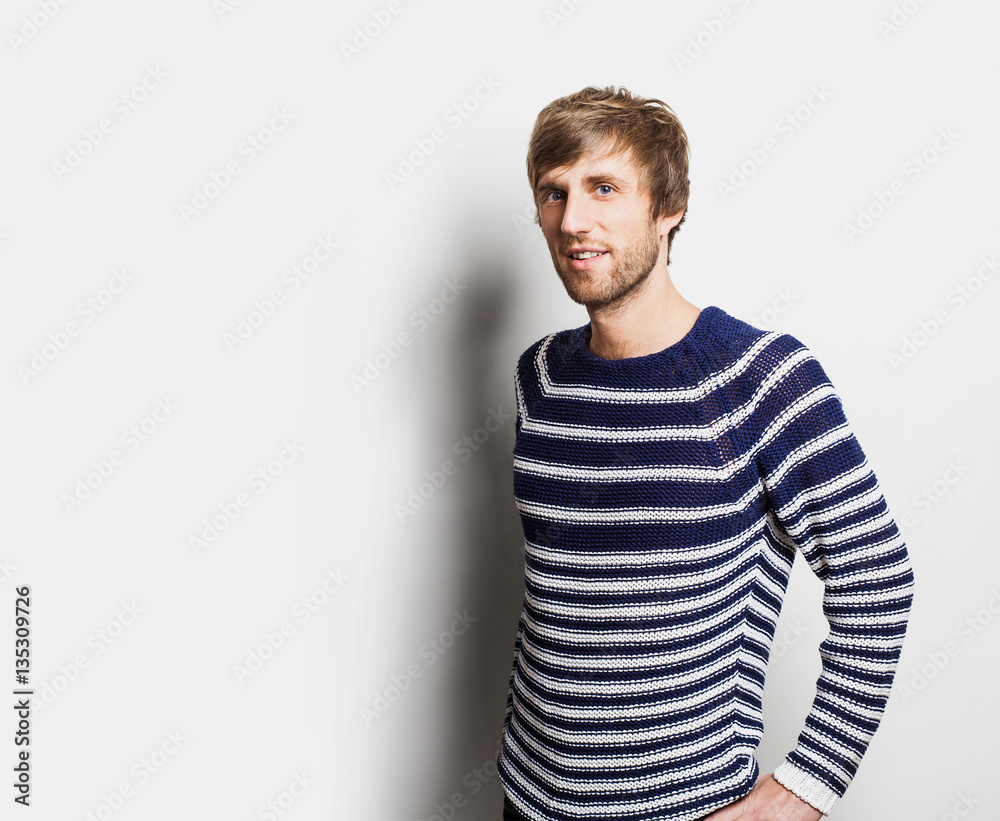 Handsome laughing young man studio portrait Handsome laughing young man studio portrait