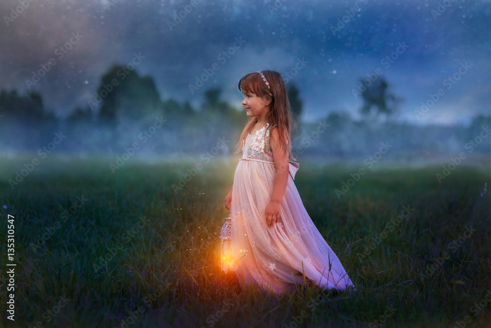 Fairytale portrait of Little girl with lightning at the night field Fairytale portrait of Little girl with lightning at the night field