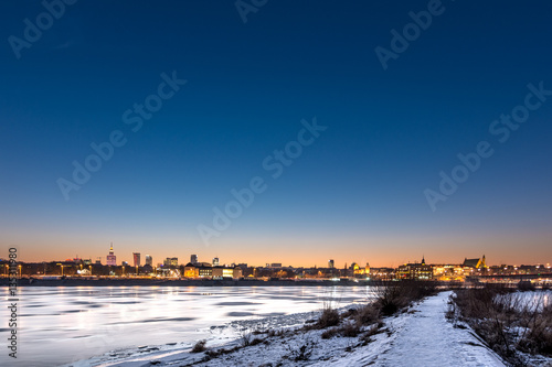 Warsaw city skyline view over river with urban architecture