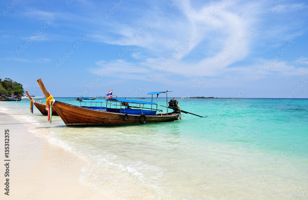 Colorful  Fishing boat  on the sea beach at Phuket Thailand