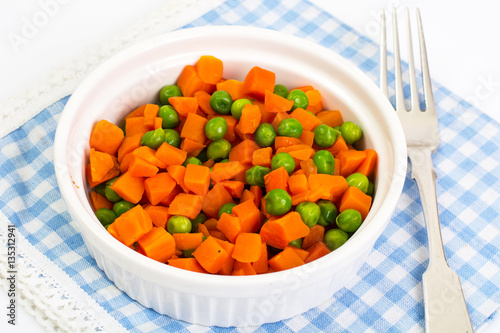 Carrots and green peas on a couple of Diet