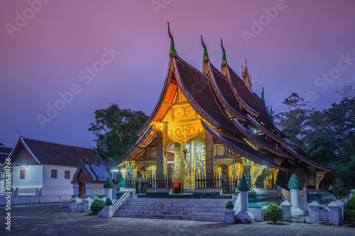 Wat Xieng thong temple at twilight time in Luang Pra bang, Laos.