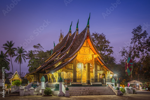 Wat Xieng thong temple at twilight time in Luang Pra bang, Laos.