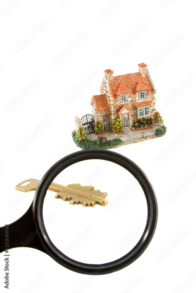 The house with keys.View through a magnifier