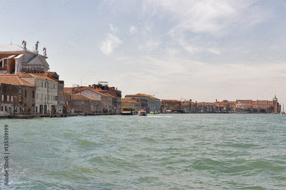 Guidecca island cityscape, view fron lagoon. Venice, Italy. Guidecca island cityscape, view fron lagoon. Venice, Italy.