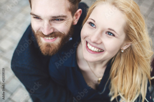 Love Story. Pair of guy and girl hugging and laughing.