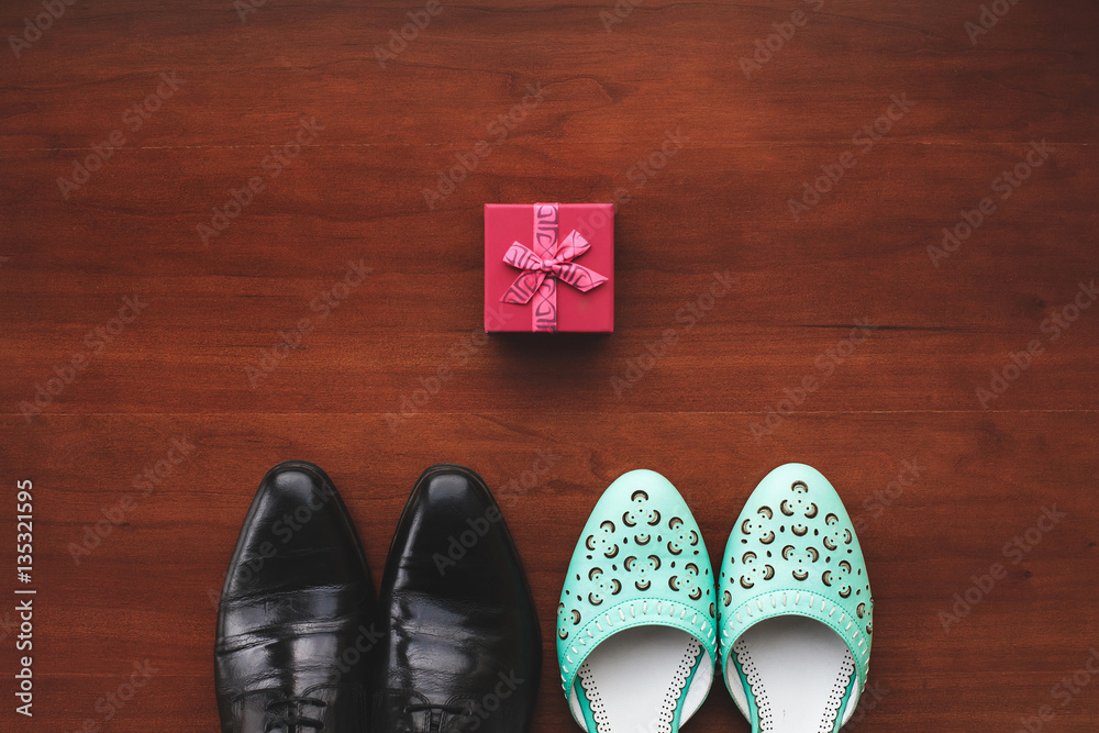 Wedding shoes of the bride and groom. Table. Floors. Wedding shoes of the bride and groom. Table. Floors.