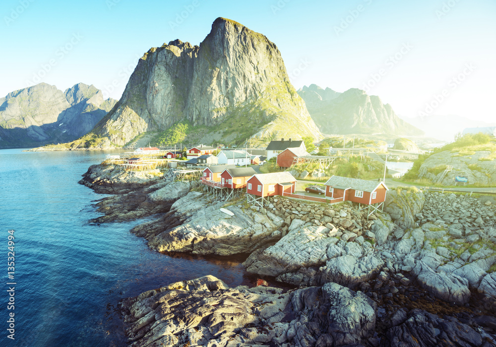Naklejka premium Fishing hut at summer time - Reine, Lofoten islands, Norway