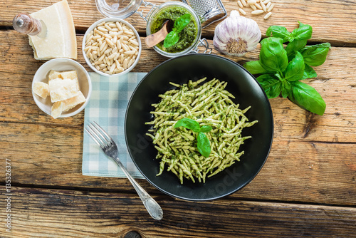 Trofie pasta with vegetarian sauce, pesto with pine nuts and bas