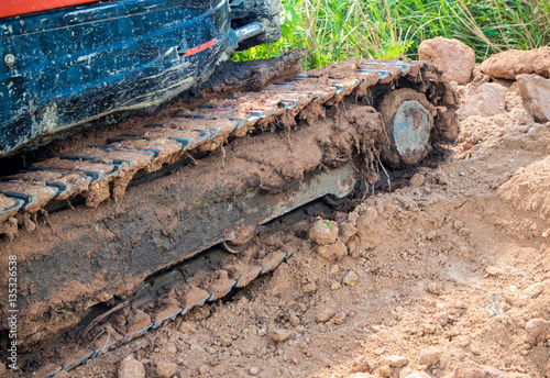 Tracked vehicle working in farm