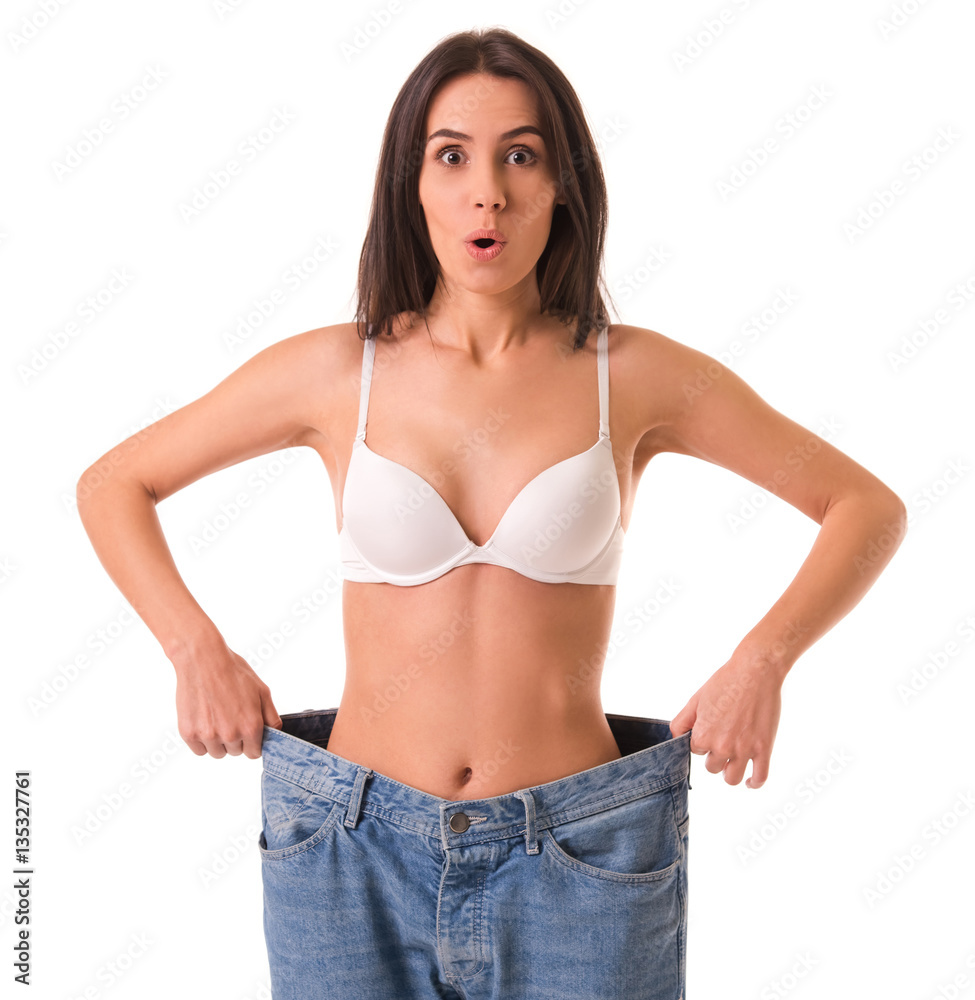 Fototapeta premium Girl showing weight loss