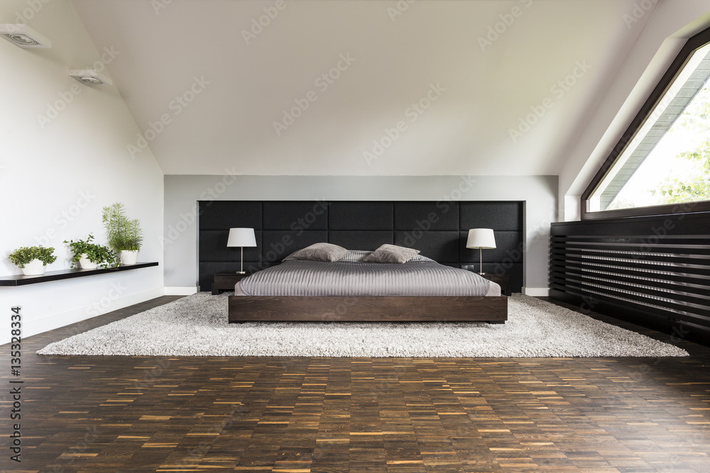 Fototapeta premium Big bed in a bedroom