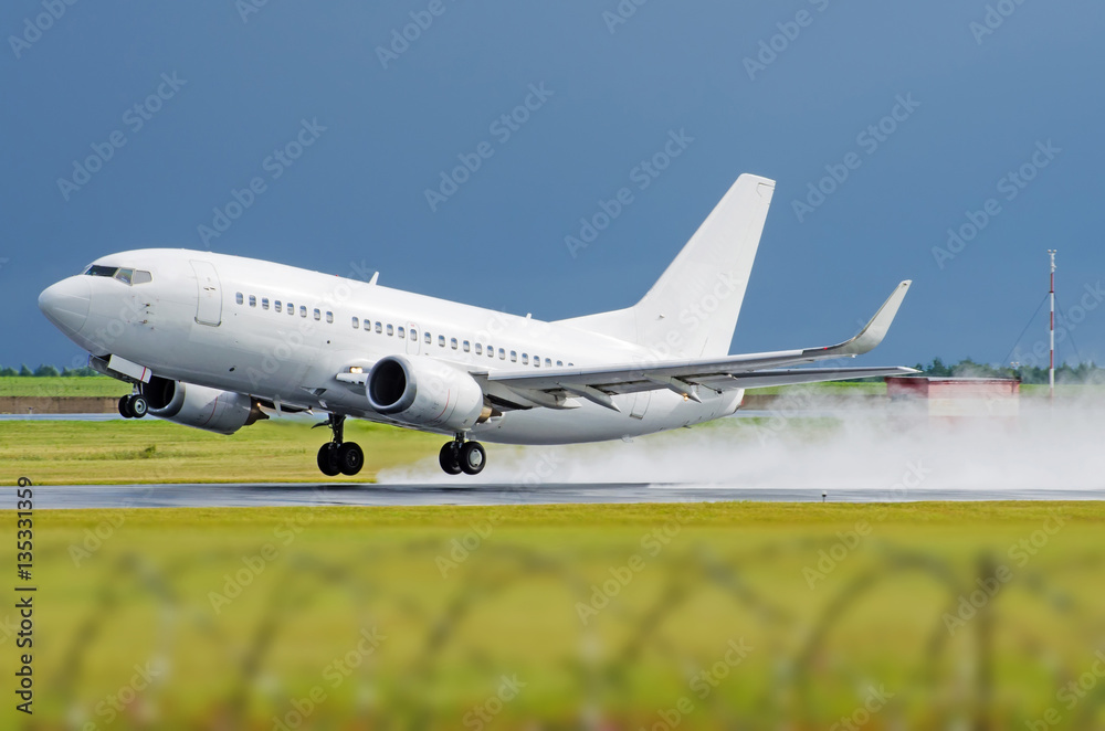 Airplane airport flight takeoff rain splashes Airplane airport flight takeoff rain splashes