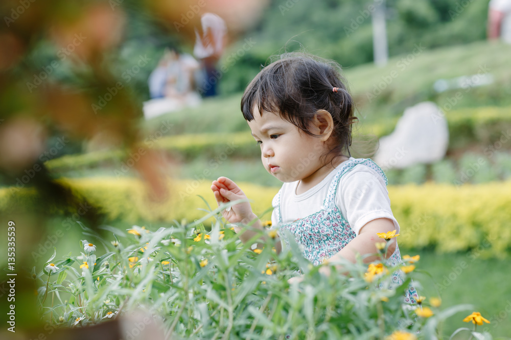 The little girl Running for fun in the garden. The little girl Running for fun in the garden.