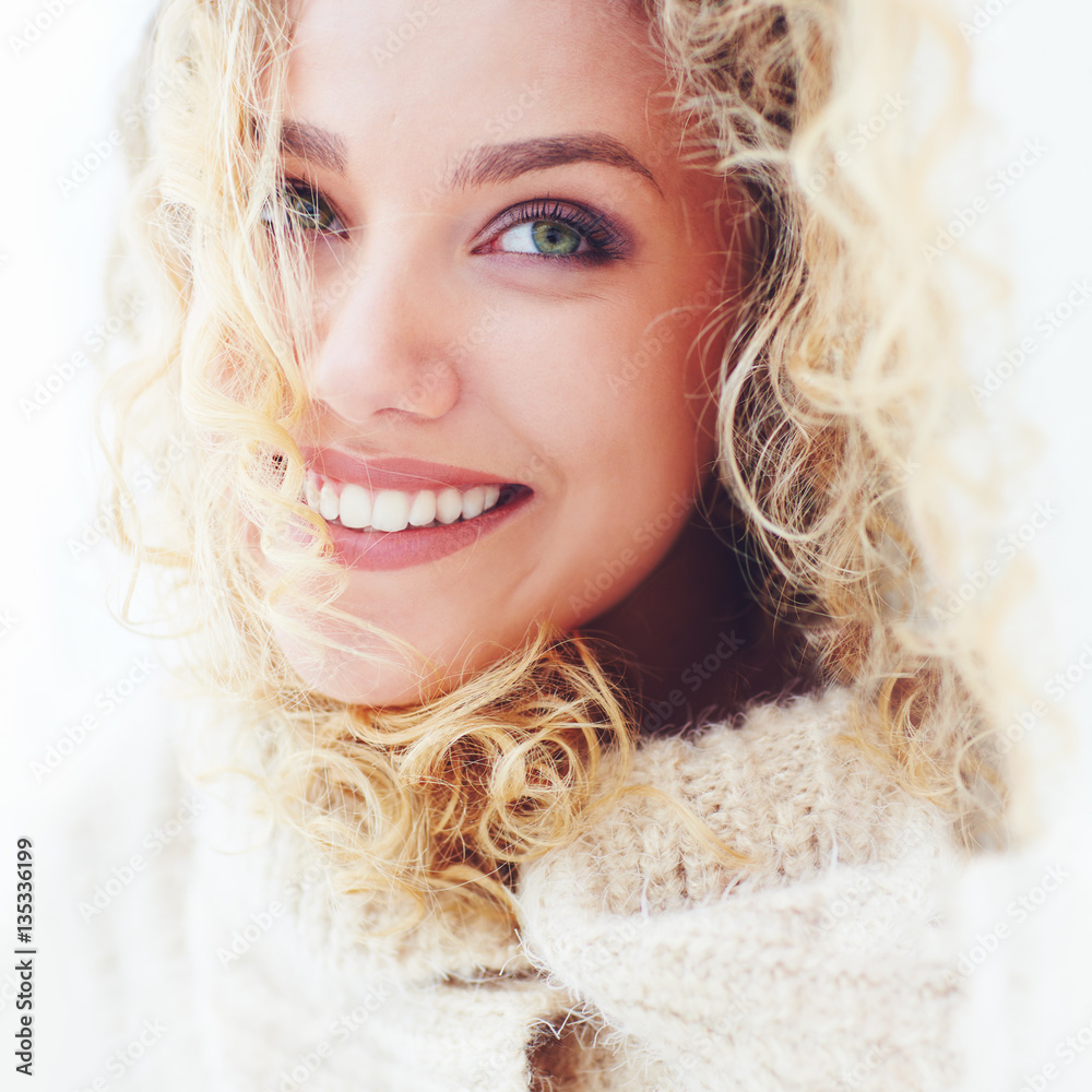 portrait of beautiful woman with curly hair and adorable smile portrait of beautiful woman with curly hair and adorable smile