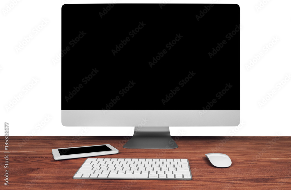 computer on a table in an office computer on a table in an office