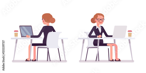 Young businesswoman working at the computer, rear and front view
