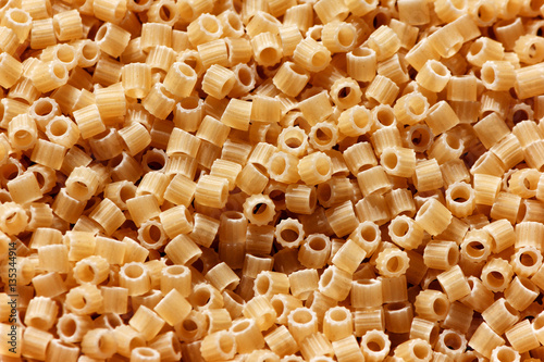 Italian round pasta macro close up background