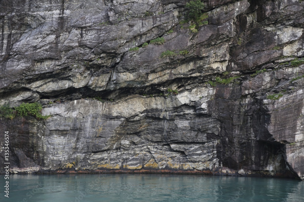 Sheer rock walls along the Norwegian Fjords