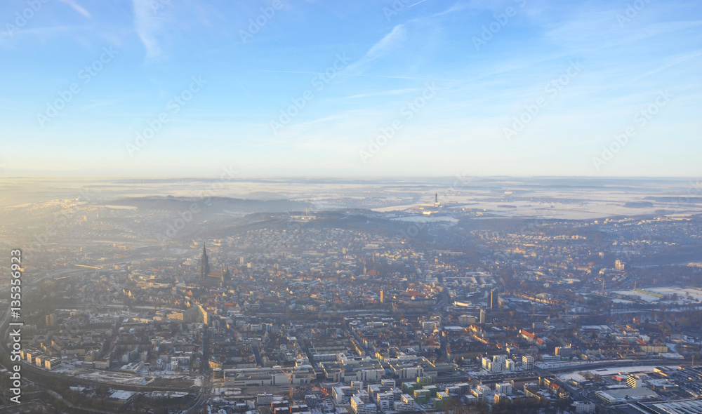 Aerial view  of foggy Ulm, south germany on a sunny winter day