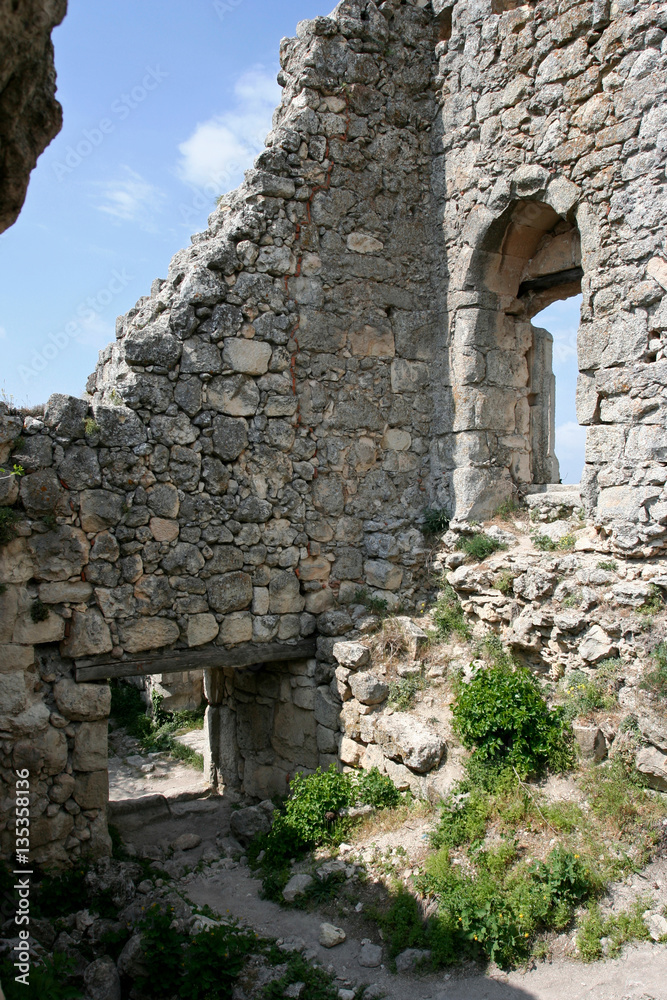 Fragment with windows of the medieval fortress Mangup Kale in Crimean Mountains, Crimea.