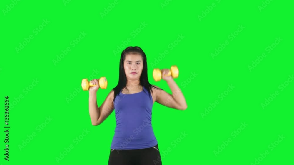 Asian woman workout with dumbbells Asian woman workout with dumbbells