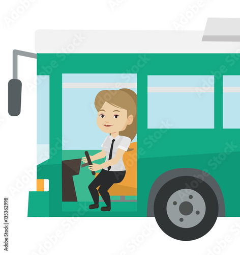 Caucasian bus driver sitting at steering wheel.