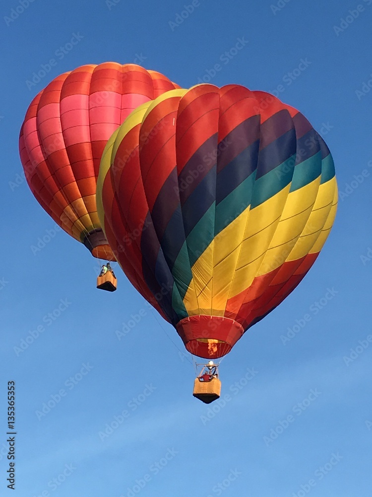 Fototapeta premium Pair of Hot Air Balloons Flying in the Sky