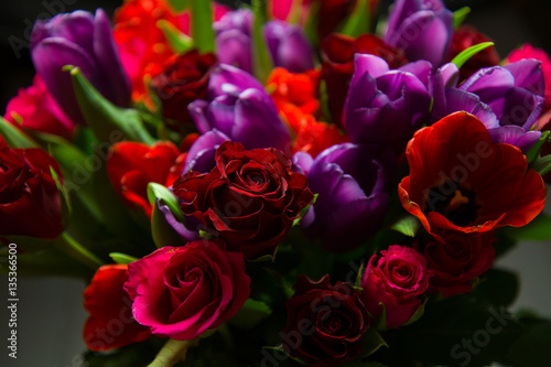 Red roses and purple tulips