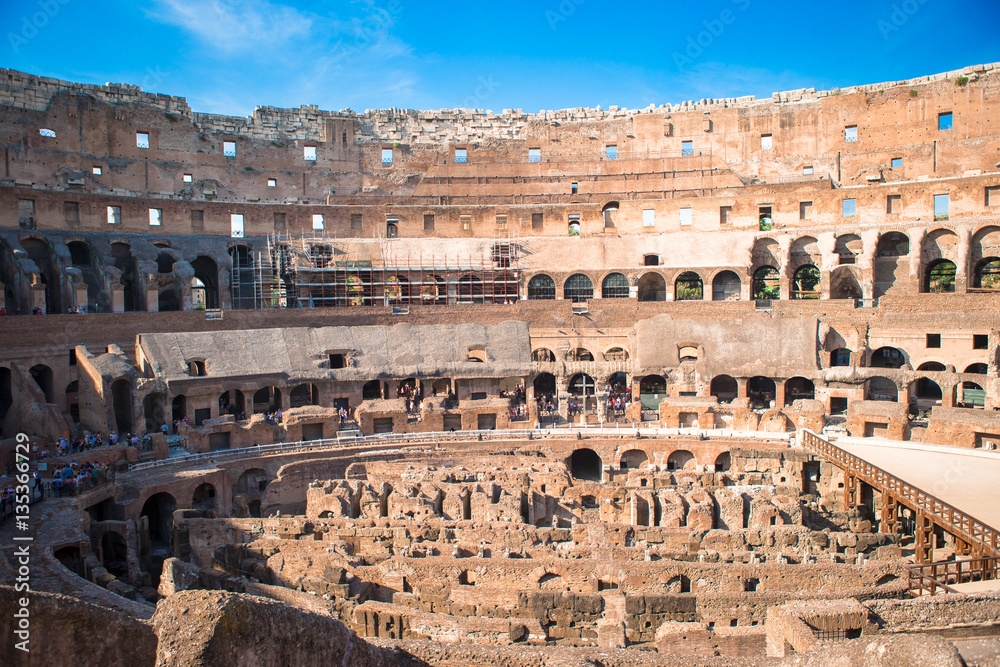 Colosseum or Coliseum indoor background blue sky in Rome, Italy