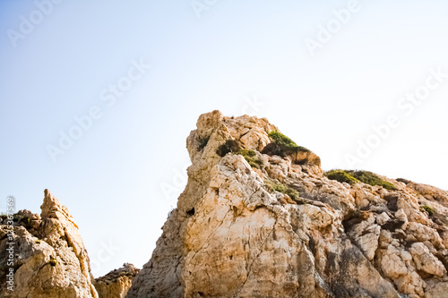 Rock on a background of blue sky