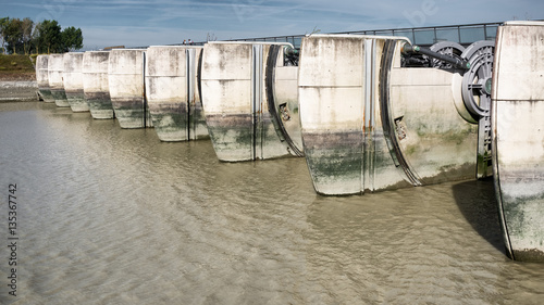 Mont-Saint-Michel hydraulic dam on Couesnon River, France photo