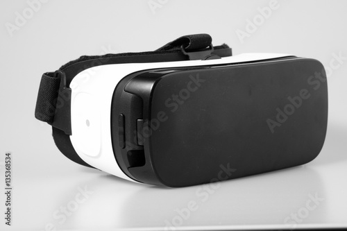 VR virtual reality glasses half turned isolated on white backgro
