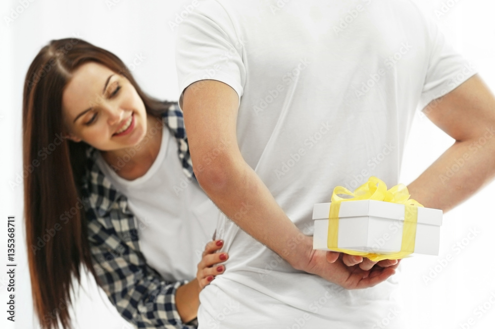 Man making present to girlfriend