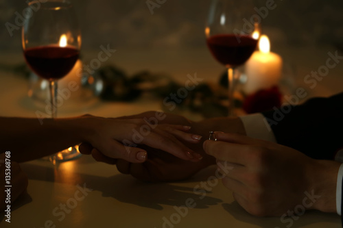 Wedding proposal in restaurant