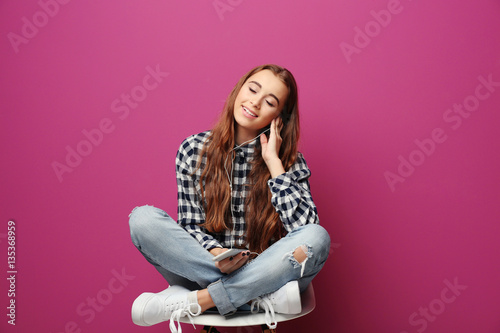 Pretty teenager girl listen...