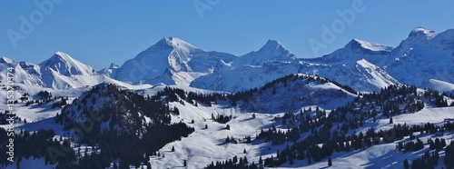 Snow covered mountain range in the Bernese Oberland